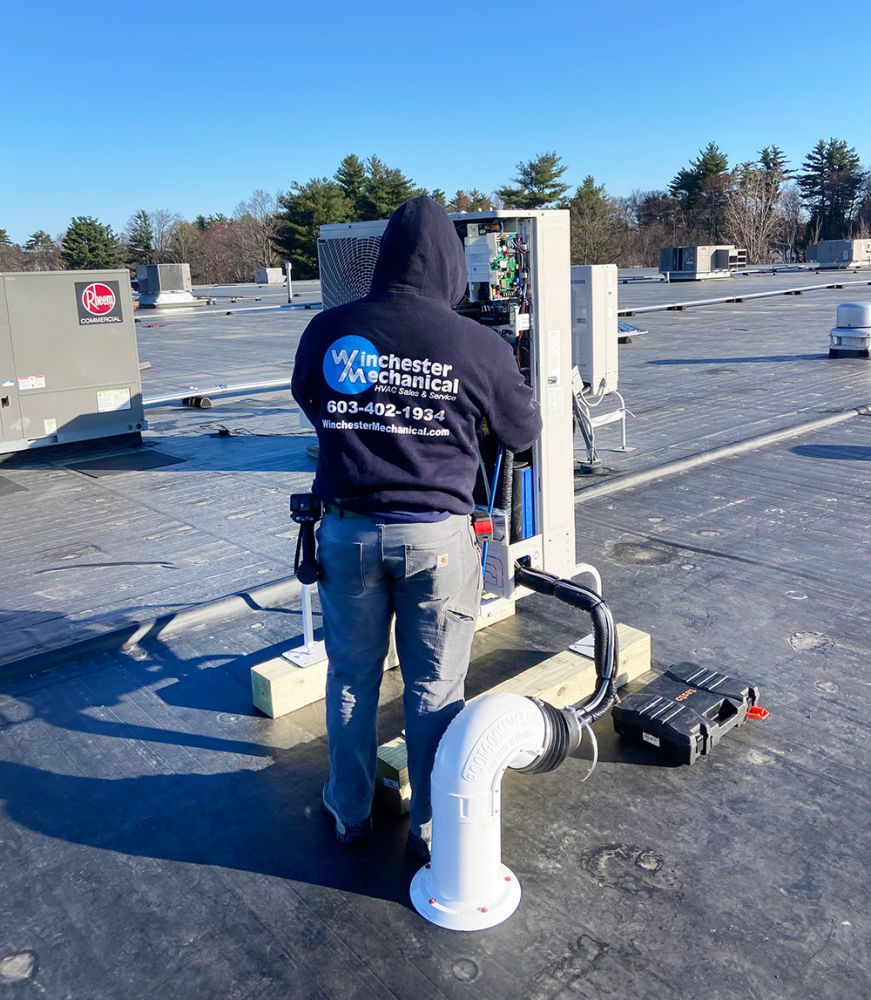 rooftop hvac worker
